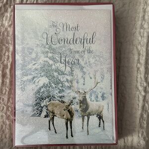 Elegant Holiday Greeting Card with Reindeer Design